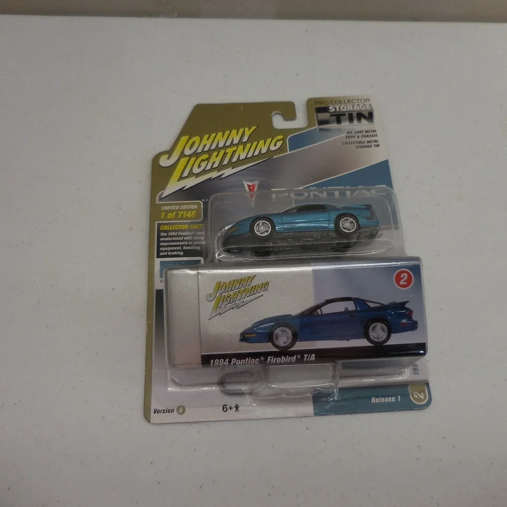 Johnny Lightning 1994 Pontiac Firebird T/A Blue Die-Cast 1:64‎ with Storage Tin